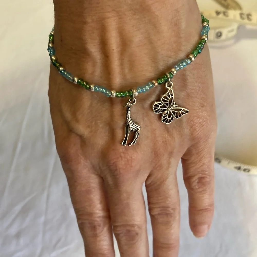 Giraffe and Butterfly green and light blue beaded bracelet Festival seashell,